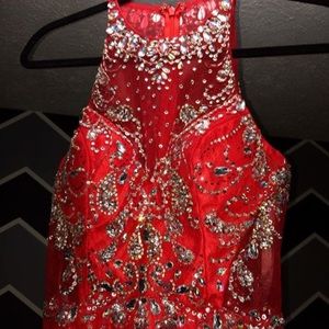 Red prom dress with long train.